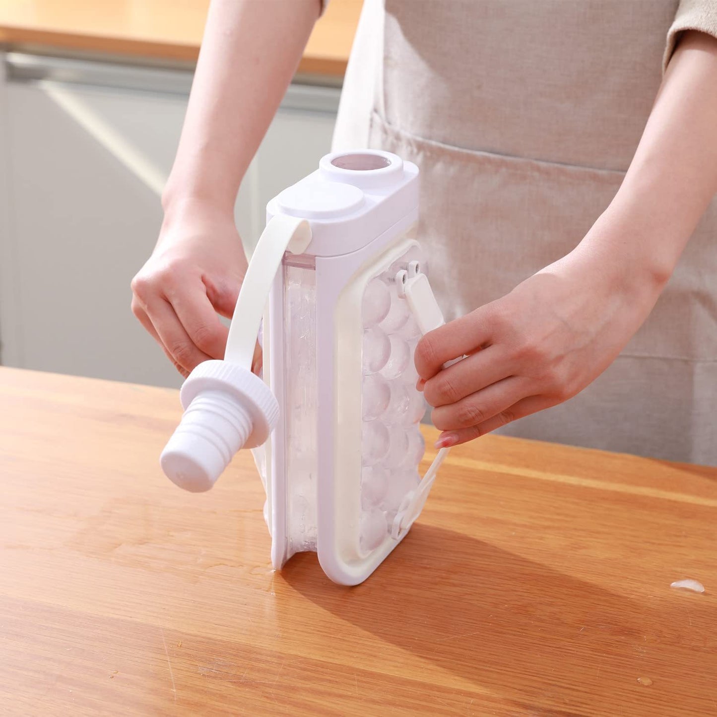 "2-in-1 Ice Ball Maker Kettle – Portable Quick-Release Cold Water Pitcher for Summer"